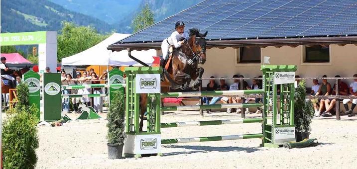 leitner-rebecca-jumping-in-the-alps-sa