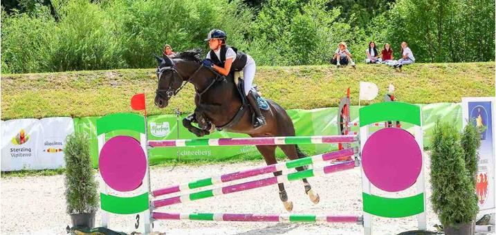 jumping-in-the-alps-wiesen-2026-rebecca-leitner